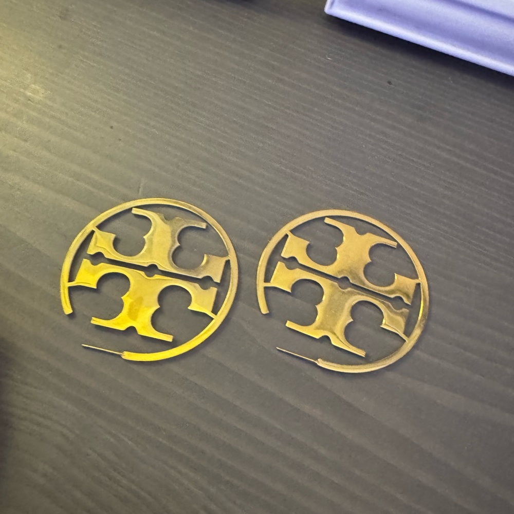 Tory Burch hoop earrings, gold plated, small imperfection as shown in photo.